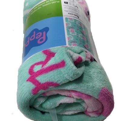 Manta azul turquesa microfibra com desenhos cor-de-rosa e branco