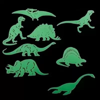 Conjunto de figuras de dinossauros verdes florescentes sobre fundo preto