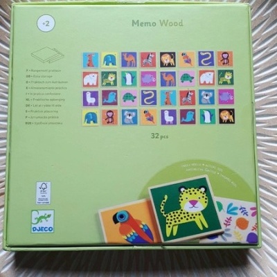 Embalagem verde do jogo Memo Wood com imagens de animais coloridos e logótipo Djeco