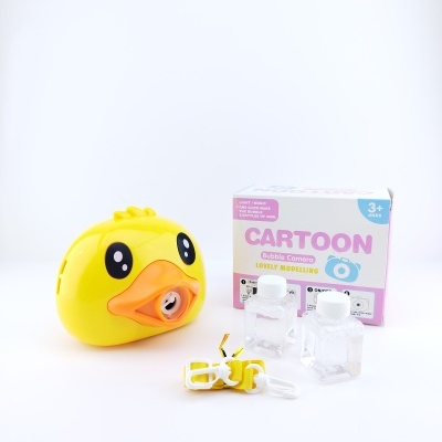 Máquina de bolhas amarela em forma de pato com acessórios e embalagem colorida