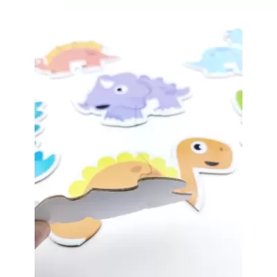 peça de quebra-cabeça de dinossauro de cartão grosso