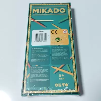 Embalagem do jogo Mikado com fundo verde e texto de segurança