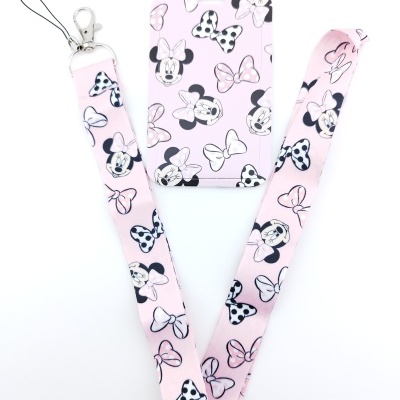 porta-cartões e fita de pendurar rosa com padrão Minnie Mouse e laços