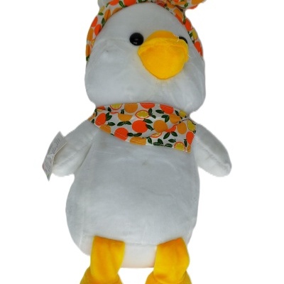 Peluche pato branco com bico e pés amarelos e lenço com padrão de laranjas