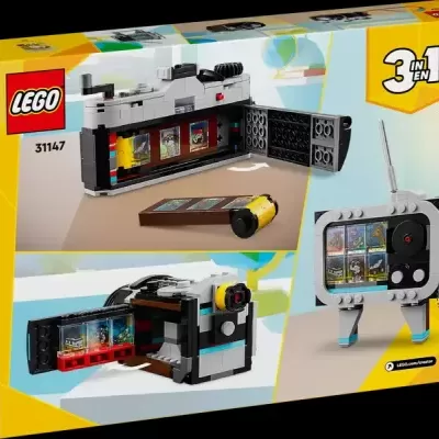 Caixa de Lego amarela com imagens de câmaras de filmar feitas com peças lego.