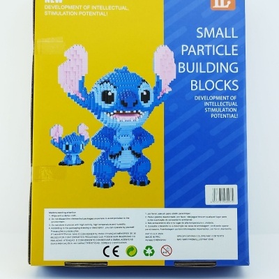 Caixa de blocos de construção Small Particle Building Blocks com personagens azuis e rosa