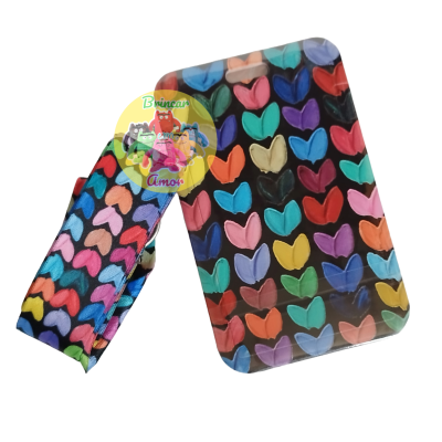 Espelho de mão com capa colorida de padrões de corações