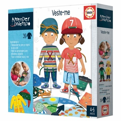 Caixa do jogo educativo 'Veste-me' com imagens de crianças a vestir roupas e instruções em português.