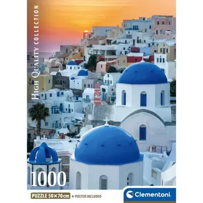 Capa de puzzle da Clementoni com imagem de casas brancas e cúpulas azuis ao pôr do sol.