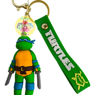 Chaveiro da Tartaruga Ninja Leonardo com tira verde e texto 'TURTLES'