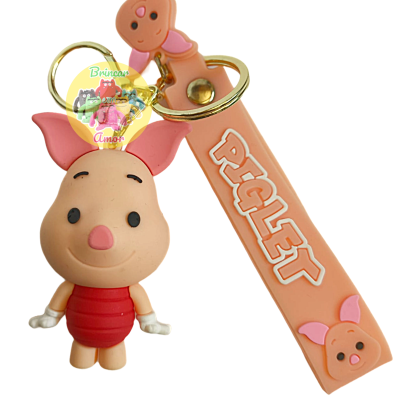 Porta-chaves de Piglet em cores rosa e vermelho com tira cor-de-rosa e texto PIGLET.