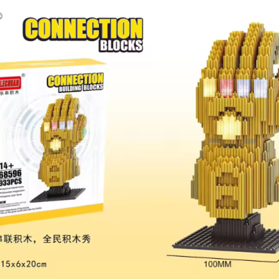 Blocos de construção LEGEND CONNECTION mão estilizada castanha em base preta com caixa amarela