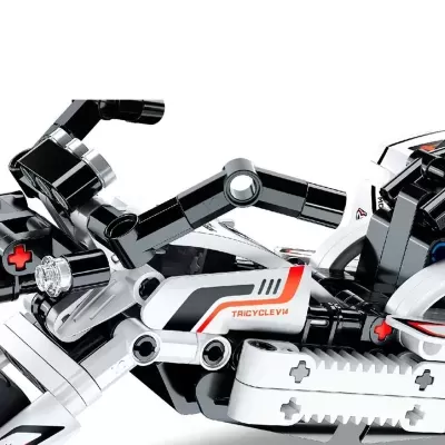 blocos de montar brancos, pretos e cinza com texto TRICYCLEVIA