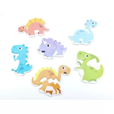 Puzzles infantis coloridos de dinossauros em cartão sobre fundo branco
