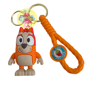 Chaveiro laranja com personagem e alça texturizada