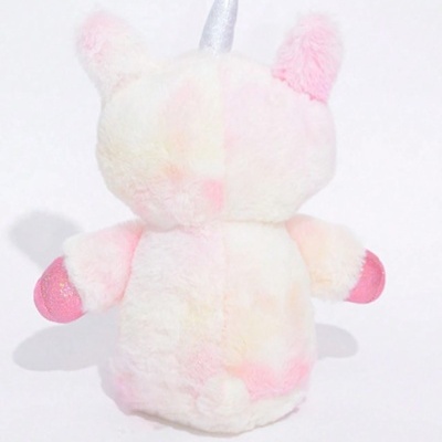 Pelúcia de unicórnio vista de trás com chifre prateado e patas rosas