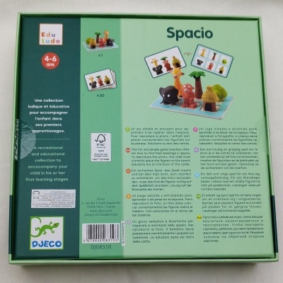 Caixa verde do jogo educativo Spacio com peças de animais e cartas ilustradas