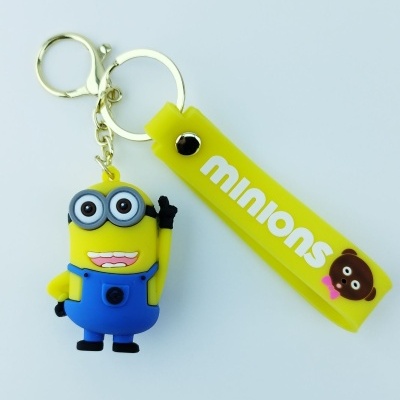 Chaveiro Minions em silicone amarelo e azul com fitilho amarelo 'minions'