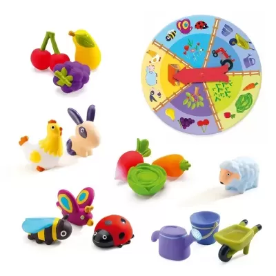 Conjunto de brinquedos coloridos de frutas, vegetais, animais e utensílios de jardim com um círculo ilustrado e ponteiro vermelho.