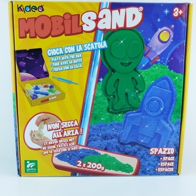 Caixa do brinquedo MOBIL SAND com formas de boneco e foguete, areia colorida e texto em italiano