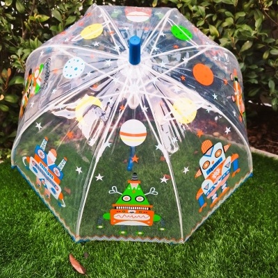 Guarda-chuva transparente com desenhos coloridos de robots e planetas