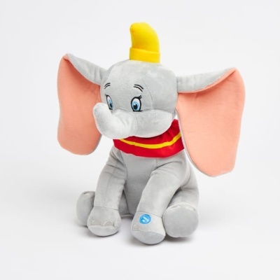 Pelúcia infantil do Dumbo cinzento com orelhas cor-de-rosa e chapéu amarelo