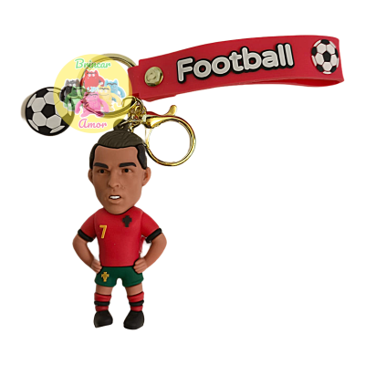 Porta-chaves de jogador de futebol com fita e bolas de futebol