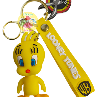 Porta-chaves amarelo LOONEY TUNES com figura Piu-Piu e fita com texto e logo WB