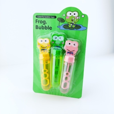 Tubo de bolhas com tampas em forma de rãs coloridas