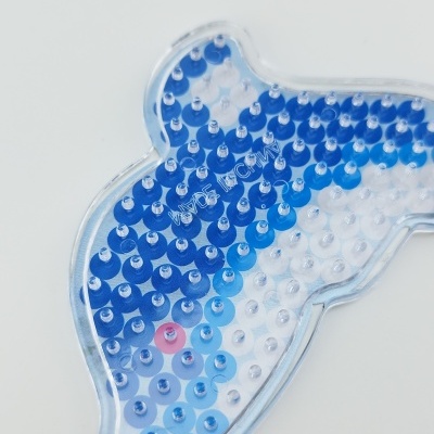 Peça de plástico transparente com pontos azuis e texto WIDE POWER