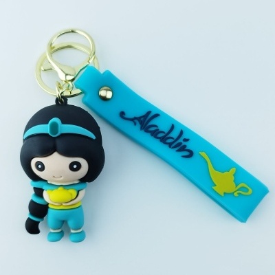 Chaveiro de personagem Jasmine e fita azul com texto Aladdin