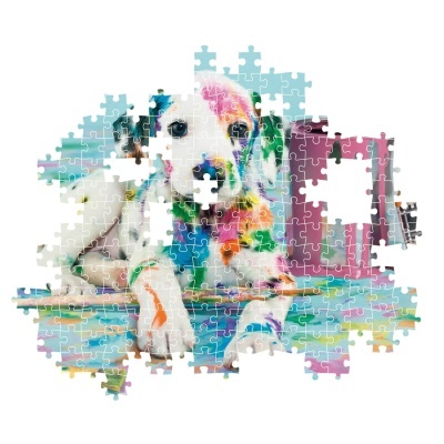 Quebra-cabeças colorido com cão pintado com várias cores e pincel