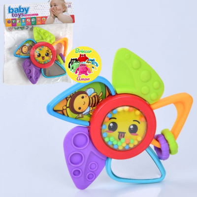 Brinquedo para bebé colorido com várias partes em plástico e embalagem visível