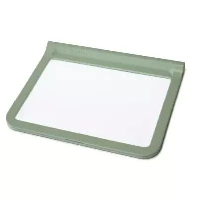 Régua de plástico verde claro com superfície branca