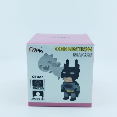 Caixa de blocos de construção CONNECTION BLOCKS com imagens pixelizadas de dinossauro e Batman