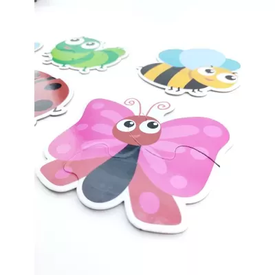 Puzzle borboleta rosa com outros insetos coloridos sobre fundo branco