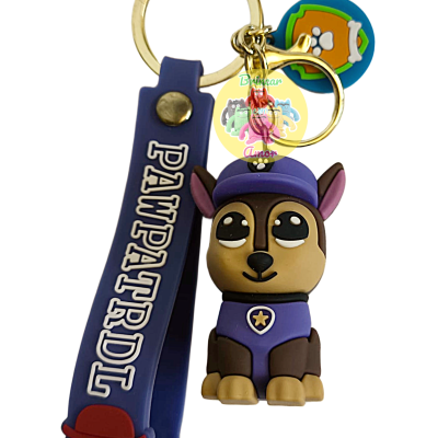Porta-chaves com personagem canino emborrachado e fita azul com texto PAWPATROL