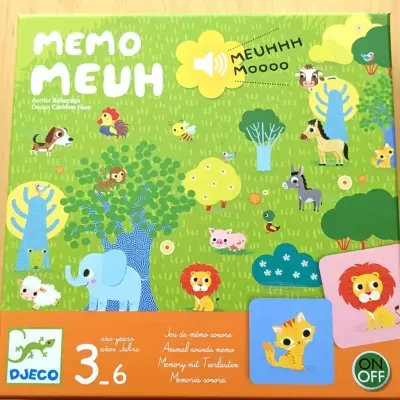 Embalagem de jogo MEMO MEUH com desenho de animais de fazenda coloridos e texto