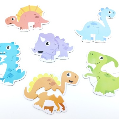 Seis puzzles infantis em forma de dinossauros coloridos sobre fundo branco