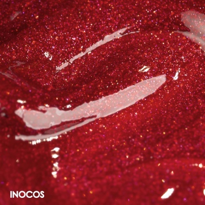 Verniz de unhas vermelho brilhante com brilho metálico e textura líquida