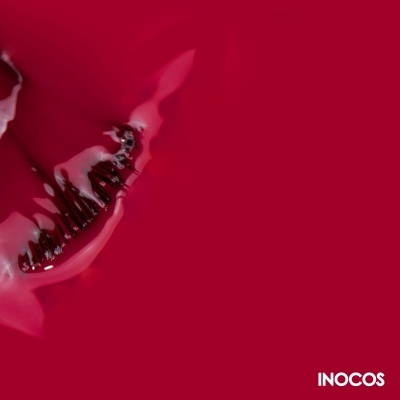 Batom líquido vermelho cremoso com embalagem e logo INOCOS