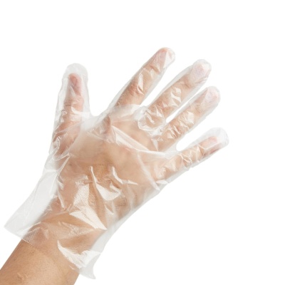 Mão com luva descartável transparente em fundo branco