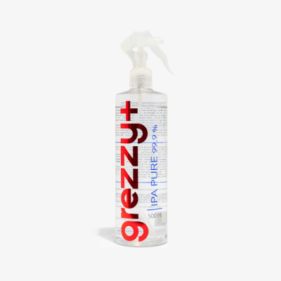 Frasco transparente com spray branco e texto 'greznt IPA PURE 99,9%'. 