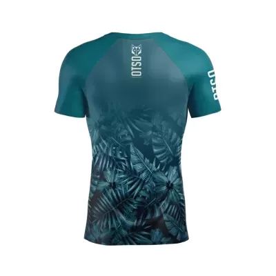 Camisola desportiva azul esverdeada com padrão de folhas tropicais e texto OTISO branco
