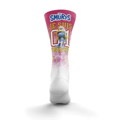 Meia branca e rosa com personagem Smurfette e texto em francês