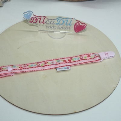 Fitinha decorativa rosa com padrão floral e fecho plástico