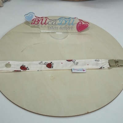 Fita para chucha com padrão de joaninhas e clip de plástico bege