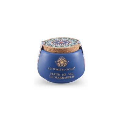 Frasco azul com tampa de cortiça e texto dourado