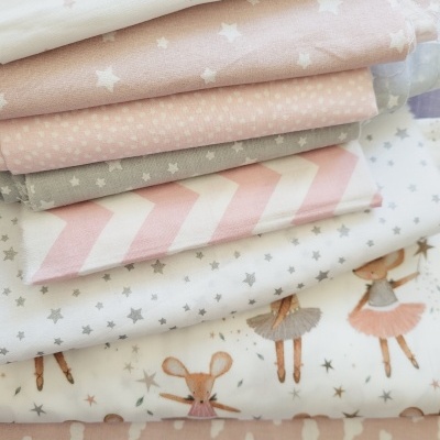 Tecido algodão com padrões de estrelas, bolinhas, chevron, nuvens e bailarinas em tons pastel