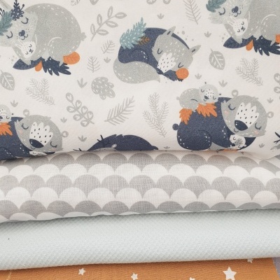 Tecidos infantis com várias estampas e cores